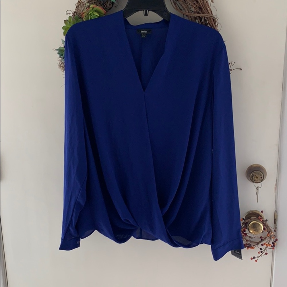 blue draped blouse